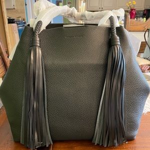 Beautiful, Edgy, Tassel Rebecca Minkoff handbag.